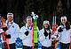 La staffetta del biathlon sul podio - da sinistra, Giacomel, Hofer, Wierer e Vittozzi